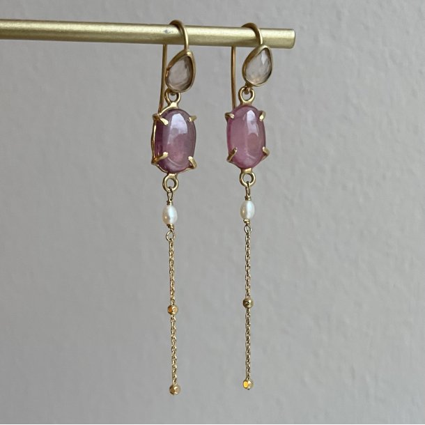 reringe med rubiner og tourmaliner