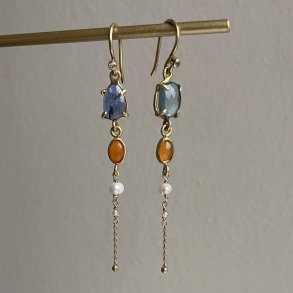 reringe tanzanite, opal og perler