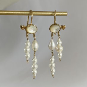 reringe med perlemor og perler